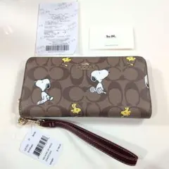 COACH コーチコラボスヌーピー シグネチャーレザースナップ二つ折り