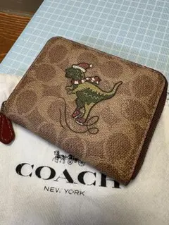 COACH レキシー 二つ折り財布 スケートボード