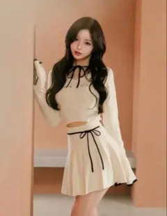 darich ダーリッチ　ウエストオープンリボンデザインニットミニワンピース