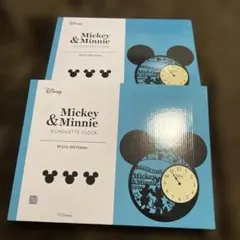 ミッキーとミニーのシルエットデザインの時計