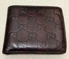 グッチ　二つ折り財布　GG柄　シマレザー　総柄　ロゴ型押し　レザー　濃茶