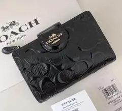 COACH コーチ　折り財布　ブラック　パテントレザー　黒色　二つ折り財布