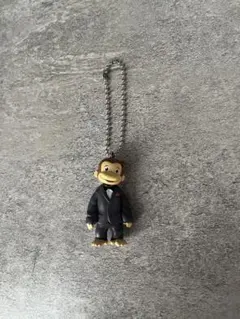 おさるのジョージ　スーツ　カプセルトイ