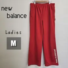 【美品】ニューバランス プリントロゴ トラックパンツ ジャージ レディースM 赤のサムネイル