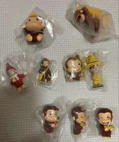 おさるのジョージ　ジョージ　ガチャ　ソフビフィギュア　コスチューム　むぎゅっと！
