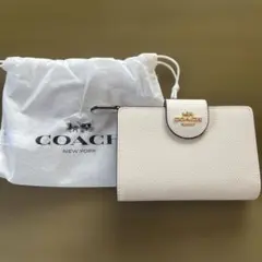 COACH 二つ折り財布 白 保存袋付き