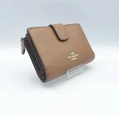 【COACH（コーチ）】二つ折り財布 ブラウン ゴールドロゴ レザー