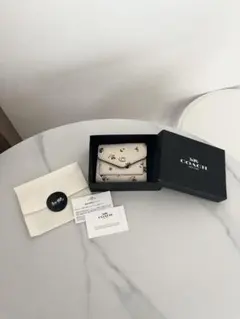 COACH 三つ折り財布 花柄 ホワイトのサムネイル