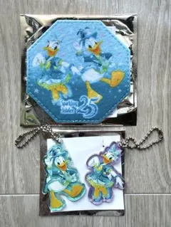 東京ディズニーシー２５周年 チャーム ＆コースター ドナルド＆デイジー