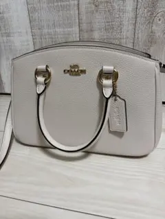 Tory Burch トリー バーチ Tモノグラムスウィング デボス ミディアム
