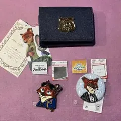 ⑬　しまむら　Disney　ちはる　ズートピア　ニック　折り財布　バッジ　３点のサムネイル