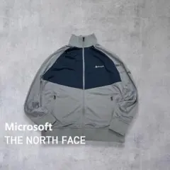 希少 ノースフェイス Microsoft 企業ロゴトラックジャケットグレーL古着のサムネイル