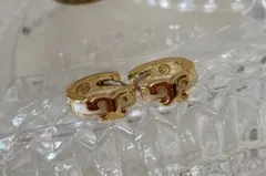 トリーバーチ　フープピアス　Tロゴ　ホワイト×ゴールド