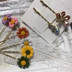 即購入不可☆✴︎ヘアピンコーナー212キラキラストーン付蝶と花のヘアピン3点セット