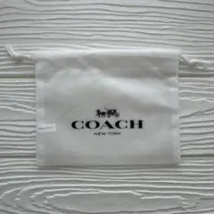 COACH コーチ 保存袋 巾着袋 不織布 ホワイト ロゴ入り