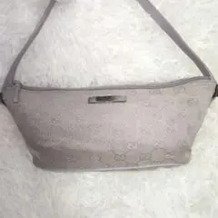 グッチ　アクセサリーポーチ　ロゴプレート　GG　キャンバス　レザー