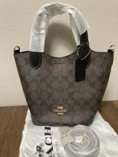 【新品】コーチ　ハンナ バケット バッグ・シグネチャー キャンバス