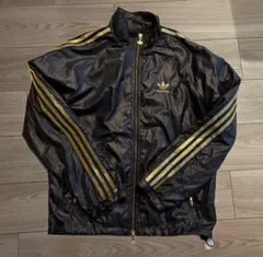 adidas ブラックナイロンジャケット ゴールドストライプ