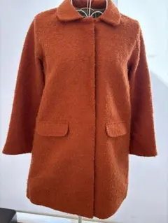 オレンジ ボアコート ボタン付き
