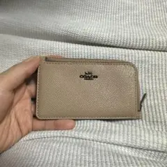 COACH ベージュ フラグメントケース