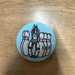 猫とピンの缶バッジ