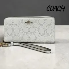 COACH 長財布 エンボス シグネチャー ストラップ付 - メルカリ