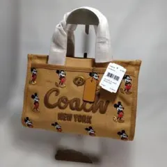【新品未使用】コーチ カーゴトート26.ディズニーバッグ　ミッキー茶　CAE70