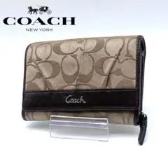 【美品】COACH レザー 二つ折り財布 シグネチャー 総柄 ダークブラウン