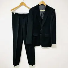 【タケオキクチ】毛100%セットアップスーツ　黒ブラック無地　背抜きシングル
