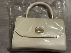 新品未開封タグ付 ハローキティ持ち手付 ロングストラップショルダープレートバッグ
