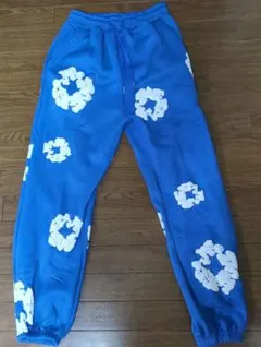 DENIM TEARS 花柄スウェットパンツ
