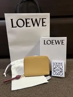 【美品】ロエベ LOEWE ジップパース ノット ミニ財布 タン パパイヤ 美品】ロエベ LOEWE ジップコインパース ノット ミニ財布 タン