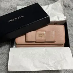 PRADA 長財布 サフィアーノ リボン ベージュ - メルカリ