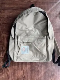 スリーコインズ　リュック　ベージュ