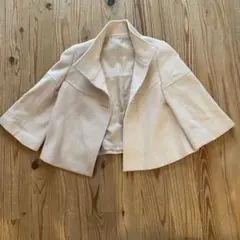 アイボリー ノーカラーフレアジャケット