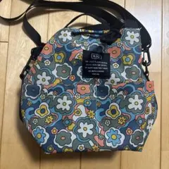 【未使用美品】kiu キウ ポケッタブルミニバッグ　花柄　ハッピーフラワーのサムネイル