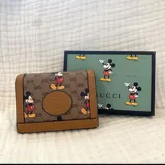 GUCCI × Disney ミッキー 二つ折り財布 - メルカリ