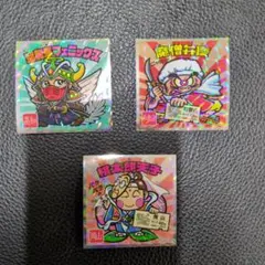 ビックリマンシール、桃太郎天子、魔僧弁慶、聖龍馬フェニックスの3枚セット。