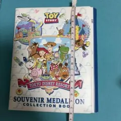 ディズニー　スーベニアメダル　トイストーリー　コレクションブック