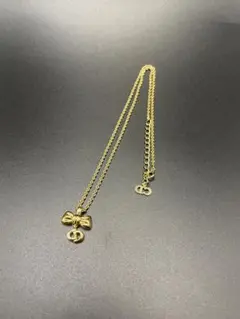 【週末セール】美品　クリスチャンディオール　リボン　ロープ　モチーフ　ゴールド クリスチャンディオール ブローチ リボンモチーフ ロープ