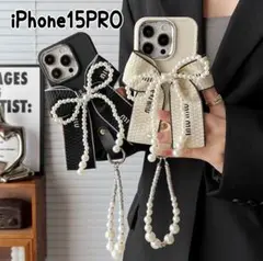 iPhone15PRO　スマホケース　リボン　パール　韓国　ストラップ付き　黒