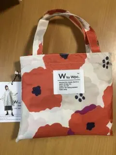W by Wpc. レインポンチョ 花柄 収納袋付きのサムネイル