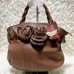 IBIZA ハンドバッグ フラワーモチーフ リボン チャーム付き 本革 ブラウン