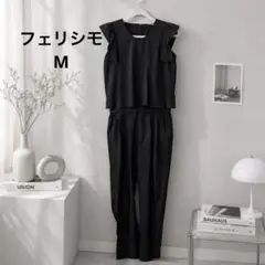 美品フェリシモオールインワン セットアップ風 ブラック フリル袖 ワイドパンツMのサムネイル