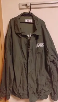 over print コーチジャケット