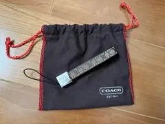 COACH ブラウンキャンバスストラップ 収納袋付き