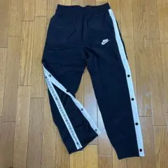 Nike ボタン付きサイドラインジャージパンツ