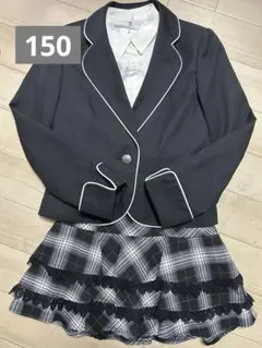 黒ジャケットとチェック柄スカートセットアップ