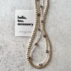 ゴールドブラウンビーズネックレス　花モチーフ　韓国　チョーカー風ネックレス