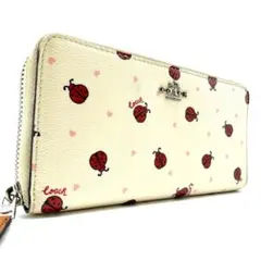 COACH　長財布　ラウンドファスナー　レザー　てんとう虫柄　馬車ロゴ　ロゴ金具のサムネイル